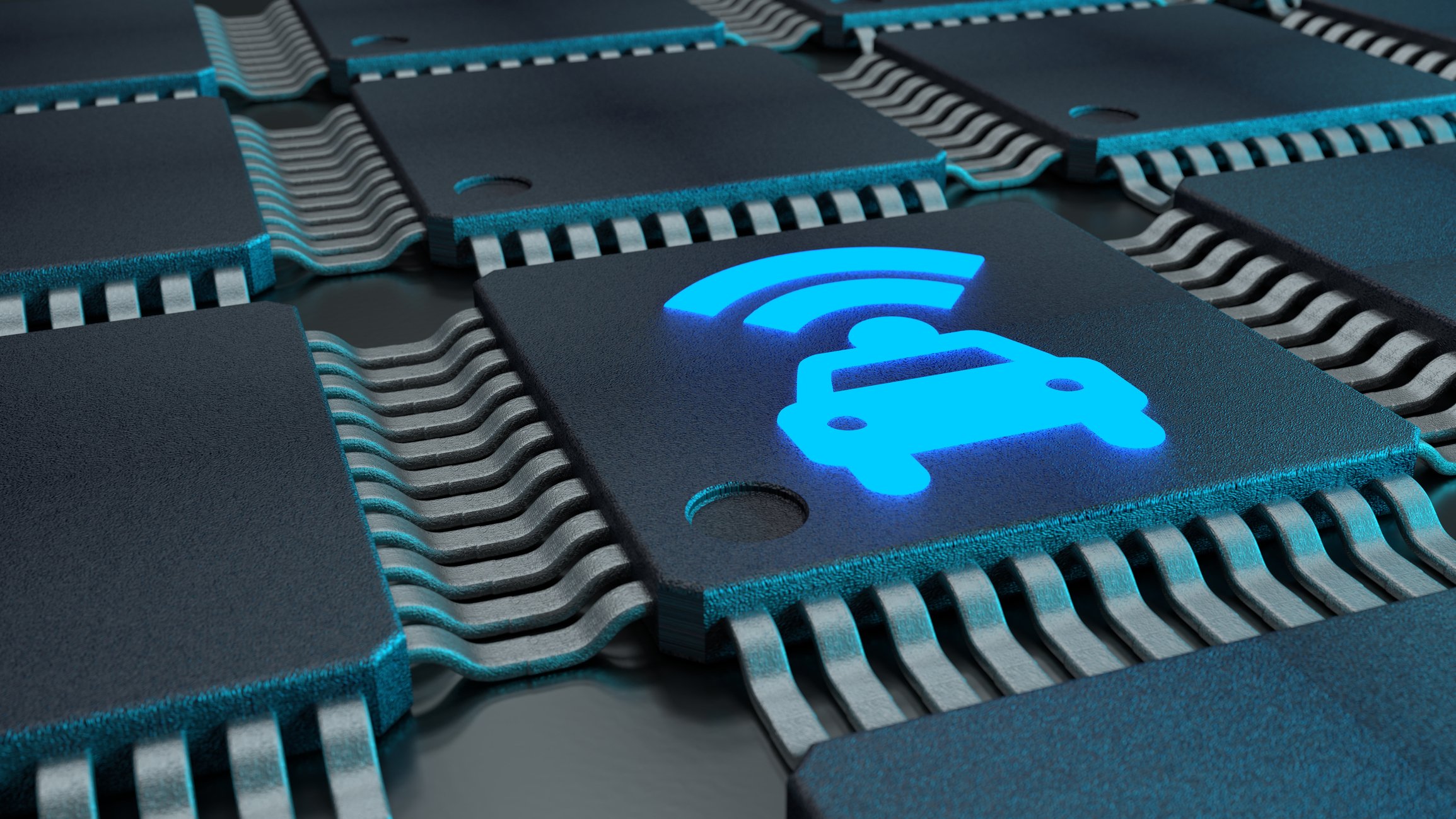 A digital rendering of many semiconductor chips, where one chip has a printed graphic of a simple car icon sending out wireless signals.