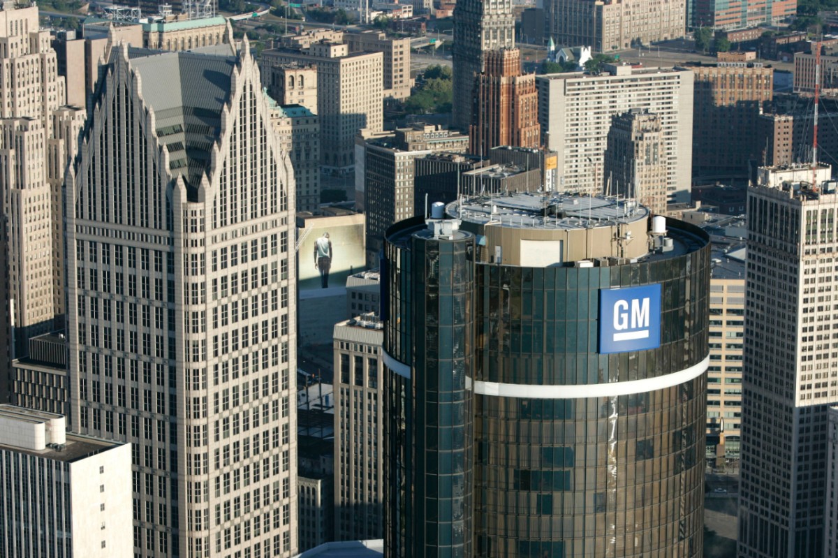 A GM sign atop the Renaissance Center, GM's corporate headquarters in downtown Detroit.