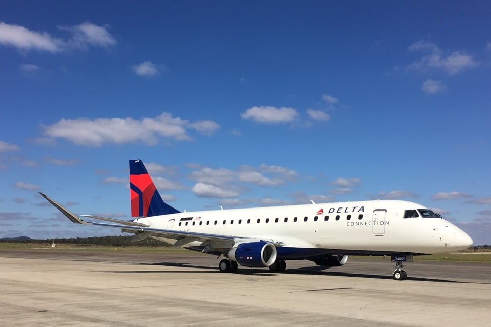 A Delta airplane on the tarmac.