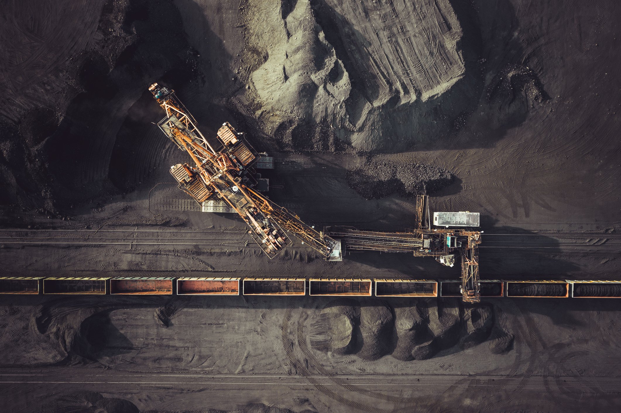 Overhead shot of a coal mine loading terminal.