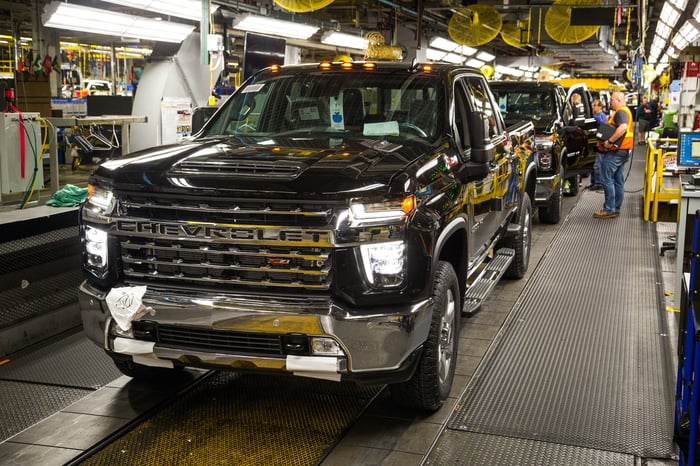 Chevrolet Silverado HD pickup trucks move down the assembly line.