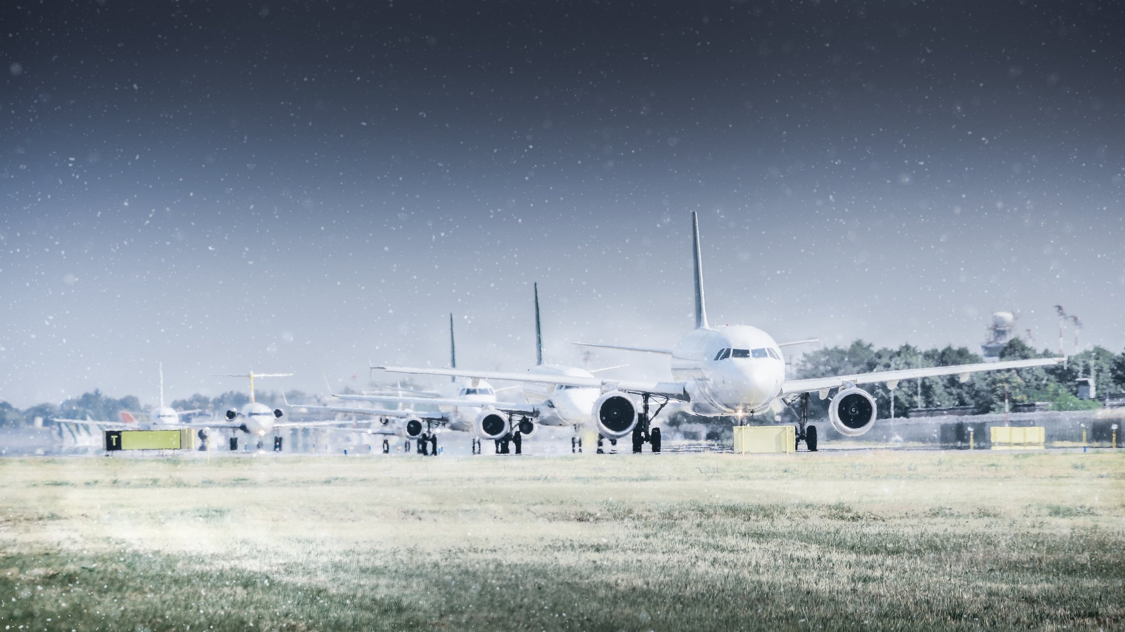 Row of airplanes on the ground