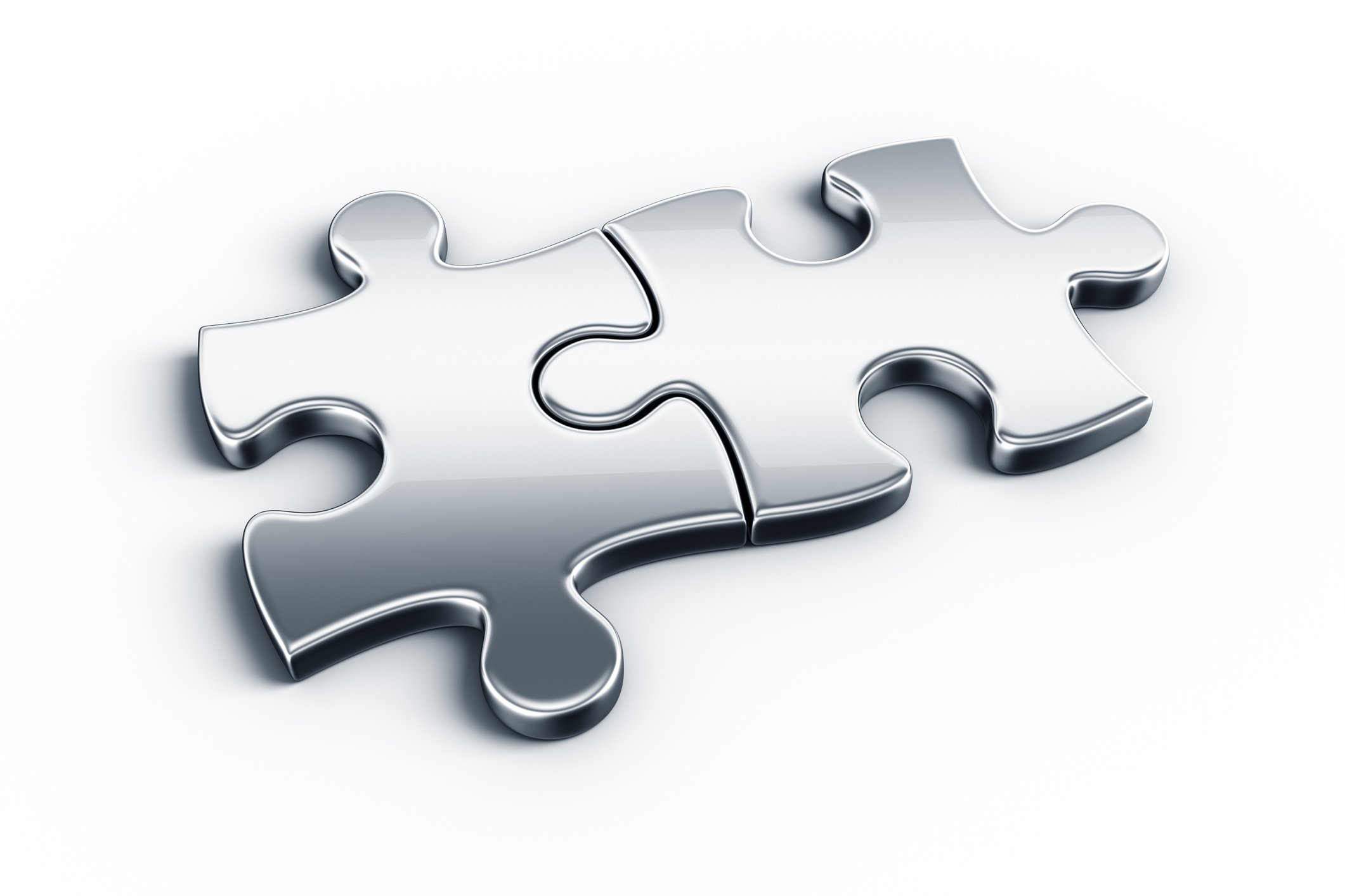 Two silver jigsaw puzzle pieces connected to each other
