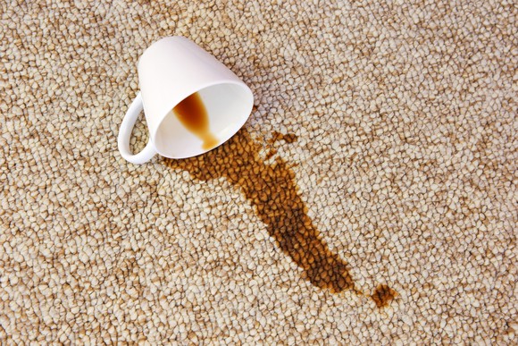 Spilled coffee on a rug.