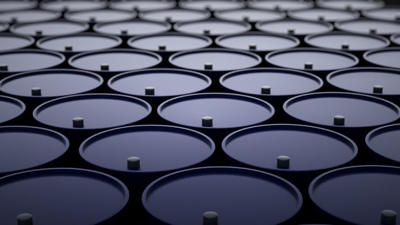 A large group of oil barrels.