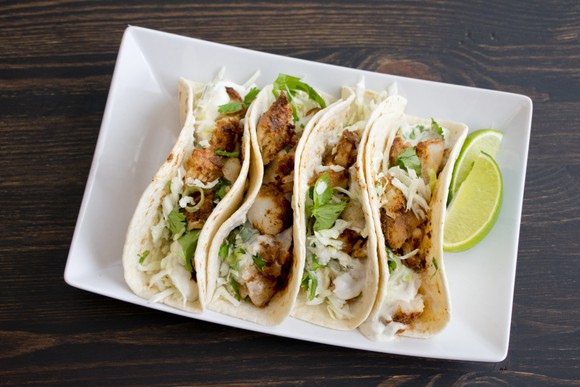 Tacos in a rectangular dish.