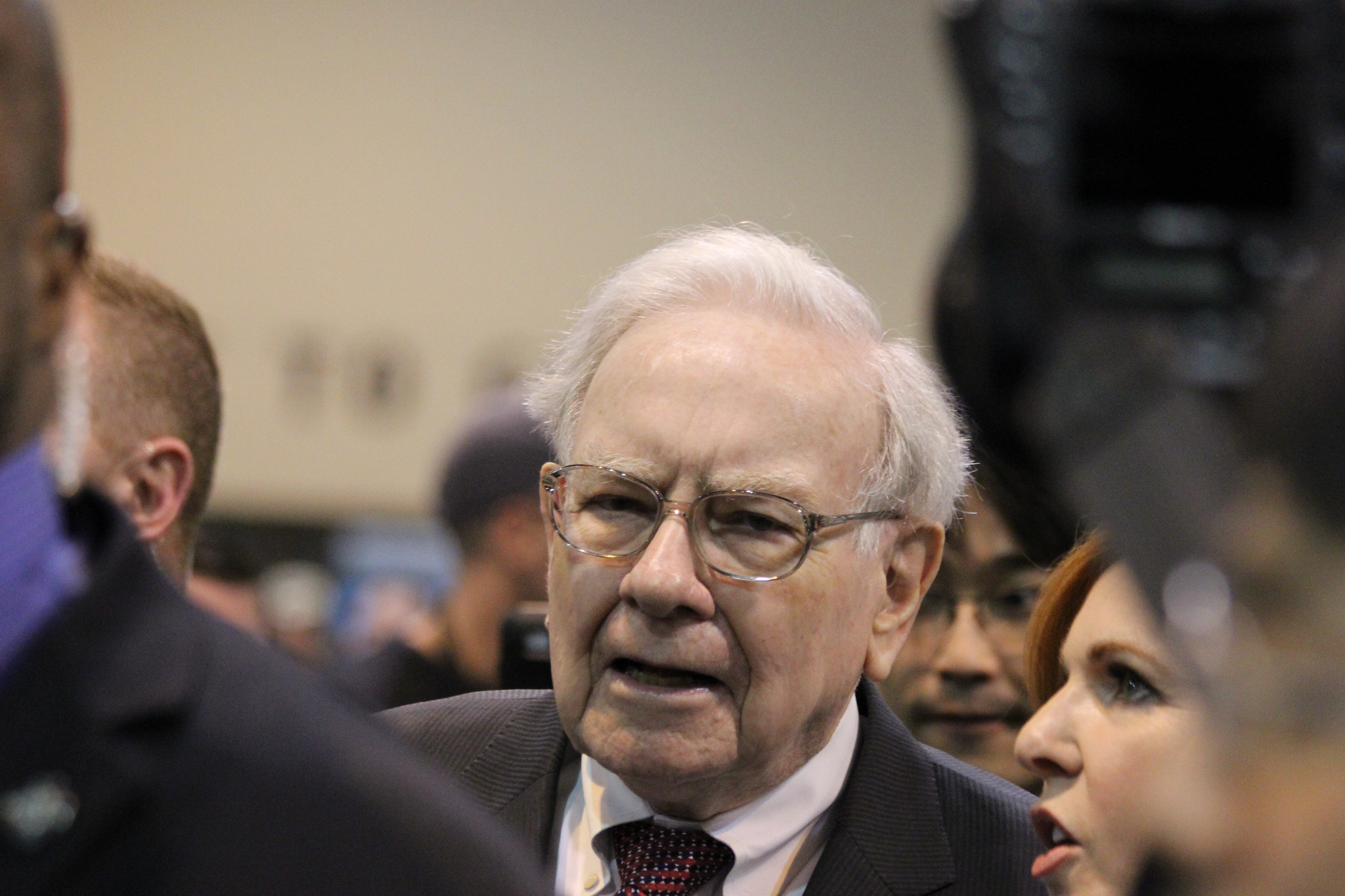 Warren Buffett in a crowd of people