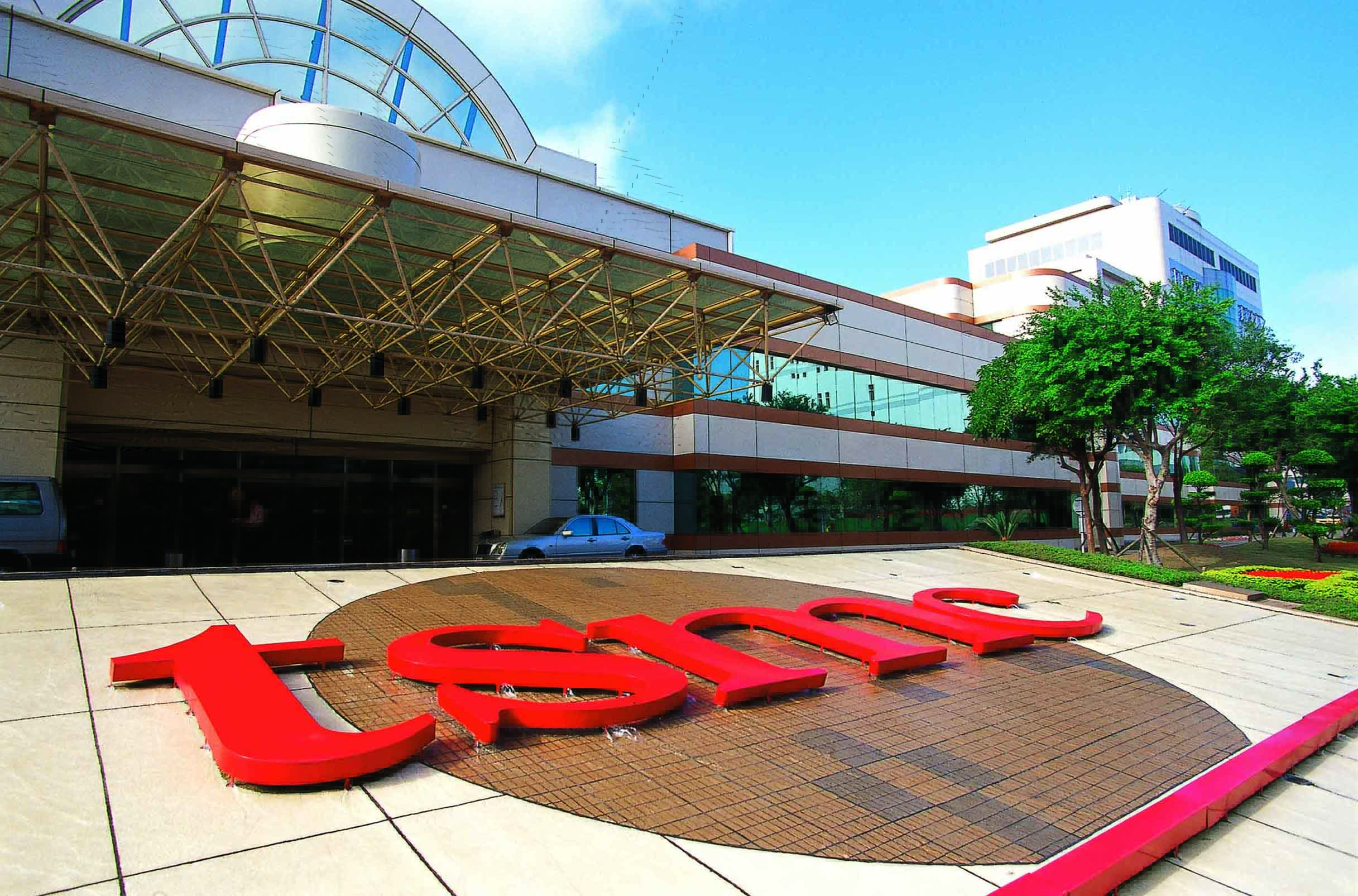 Entry to a TSMC fab with "tsmc" on the ground