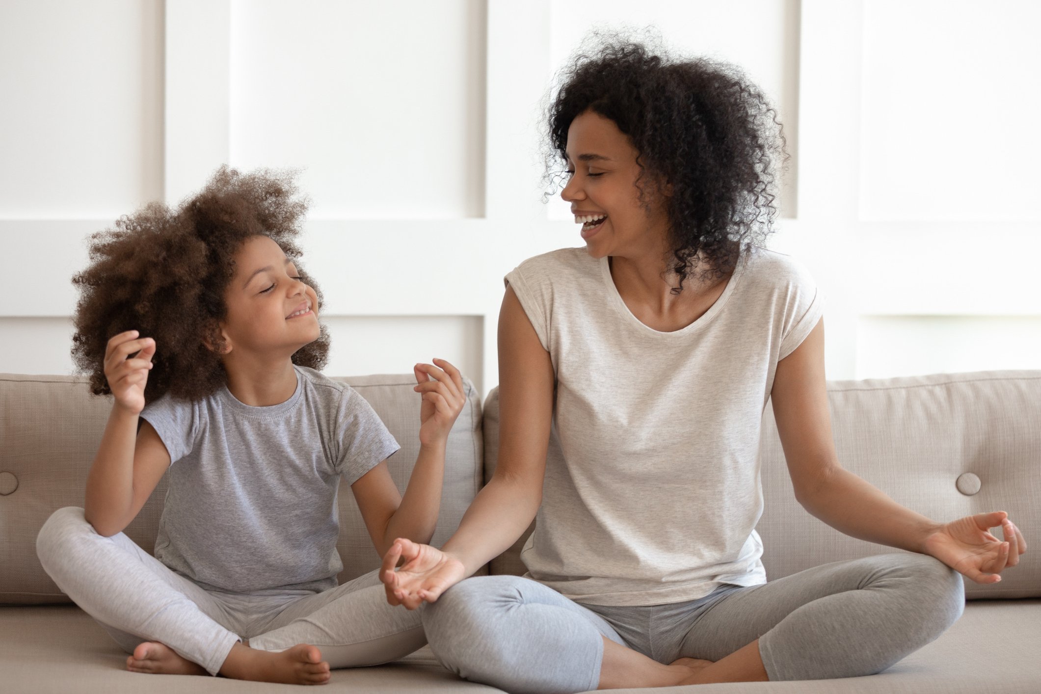 Mother and daughter wearing athleisure clothing.