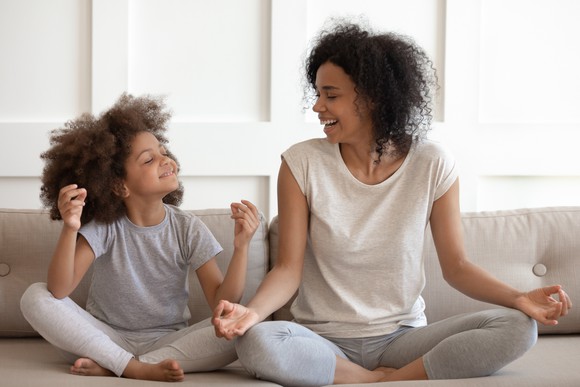 Mother and daughter wearing athleisure clothing.