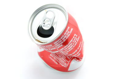 Slightly crumpled Coke can