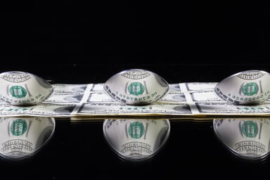 Money with stainless steel spoons