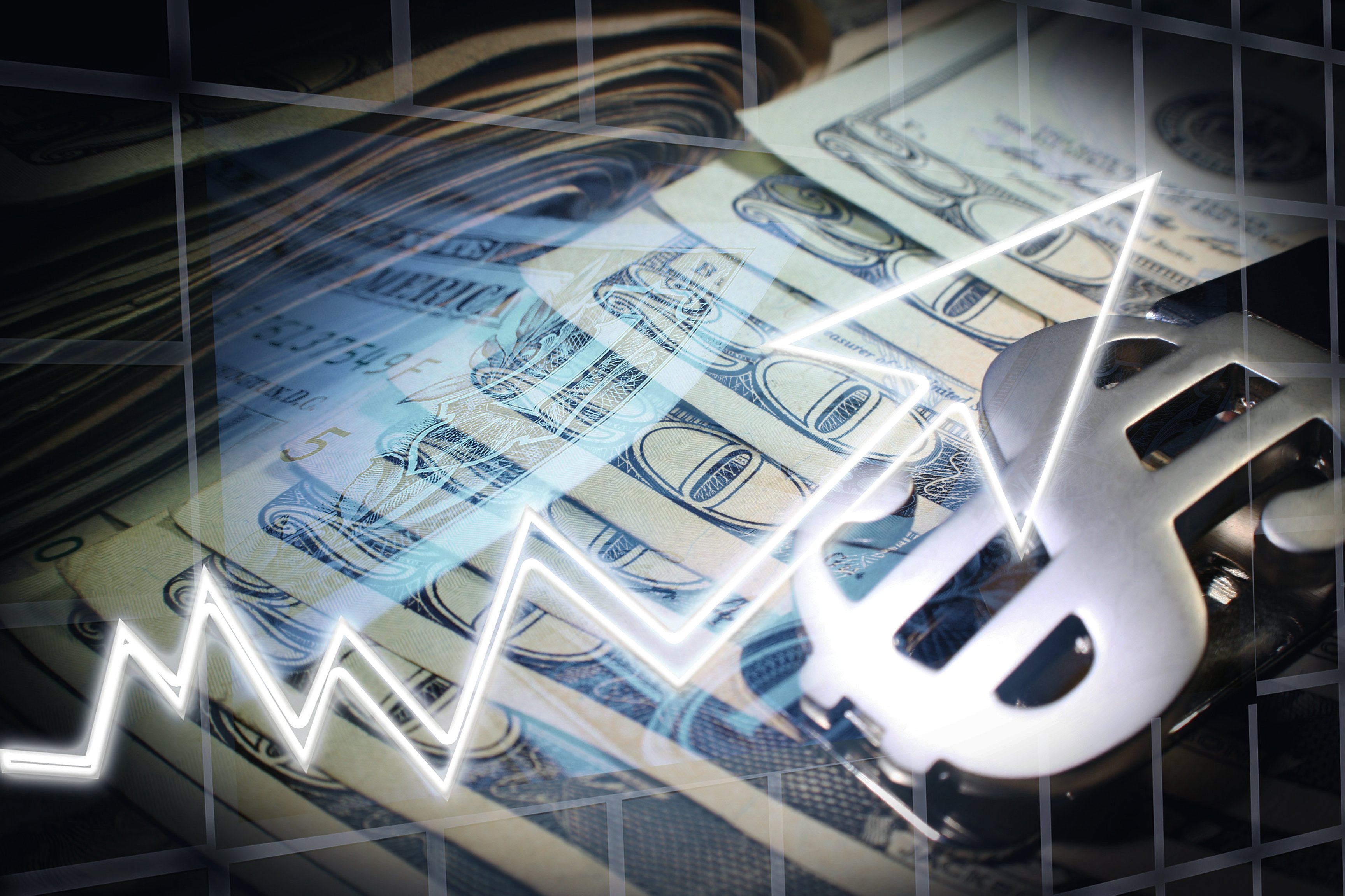 Stacks of money with an arrow pointing upward.