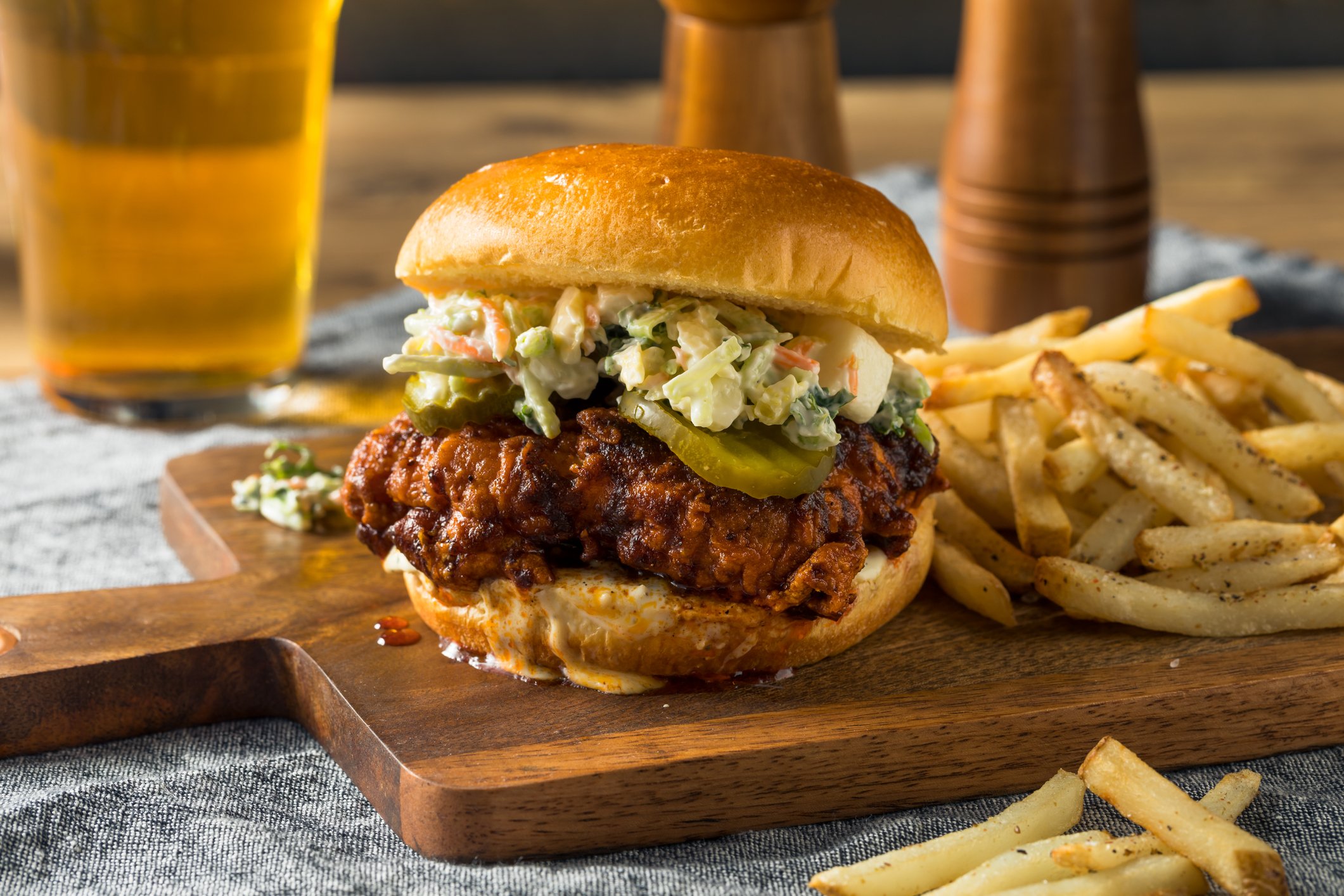 Chicken sandwich with fries.