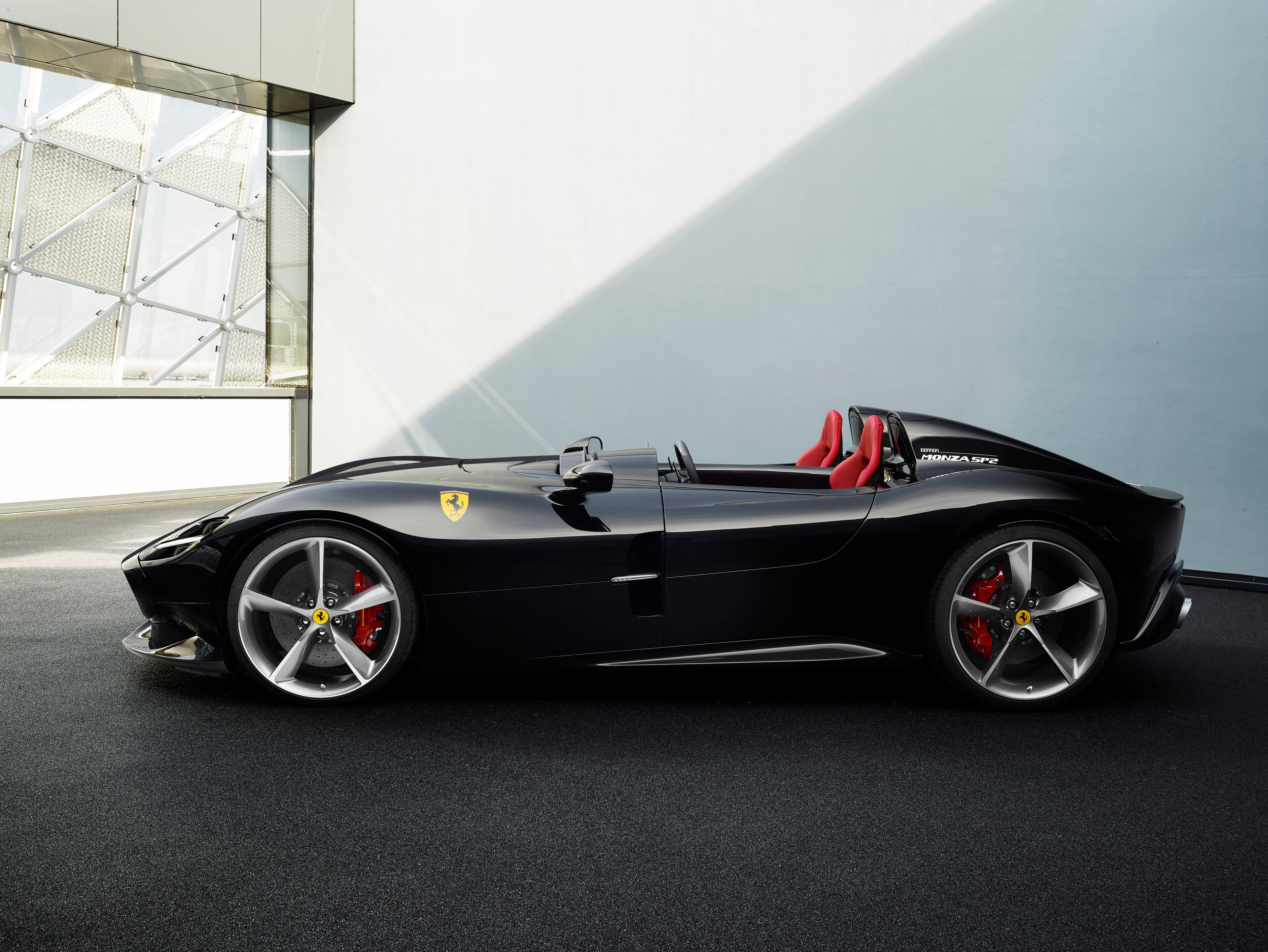 A Ferrari Monza SP2, a stripped-down open sports car. 