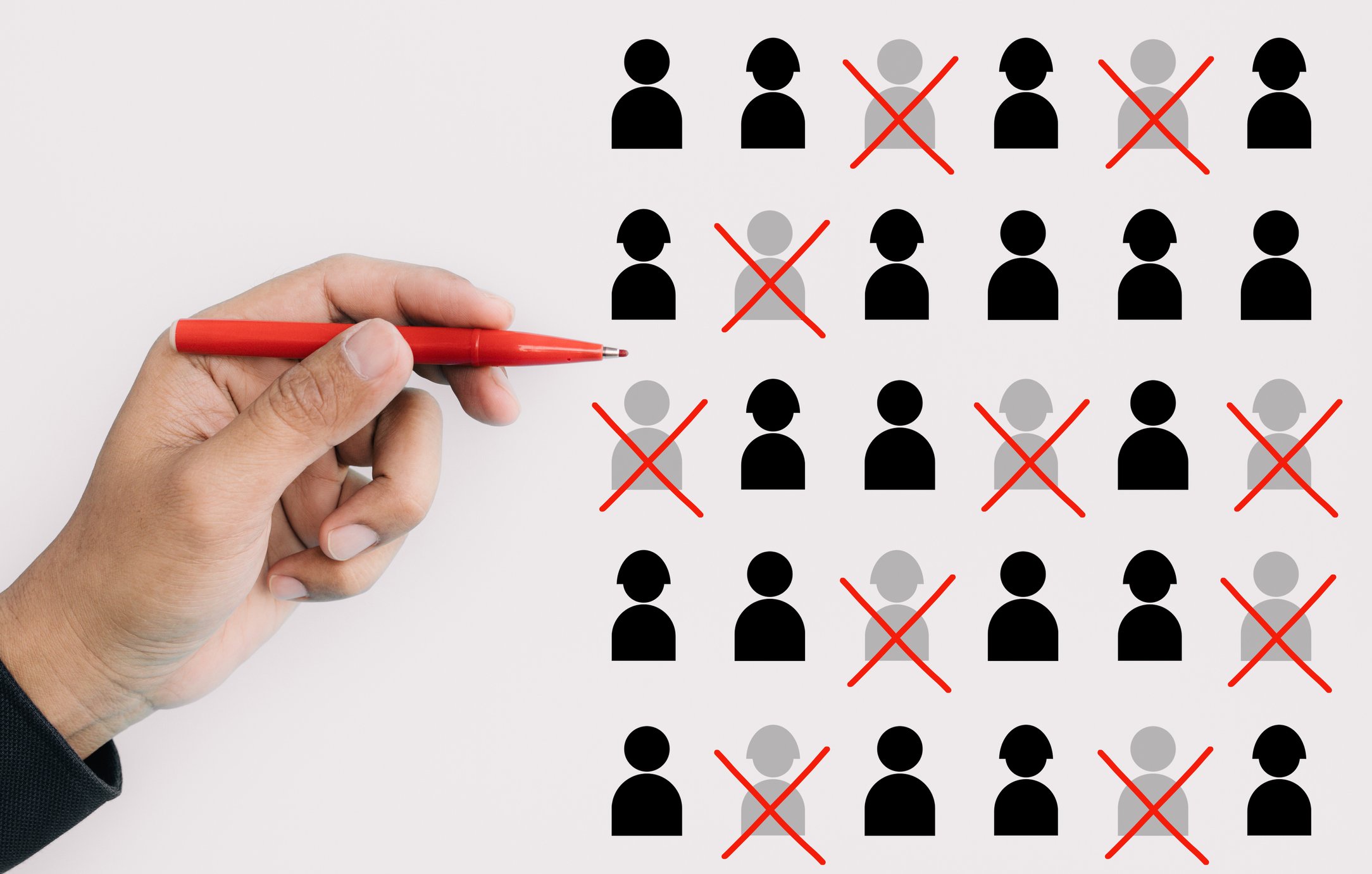 images of people representing employees with some marked off with an "x" showing job cuts