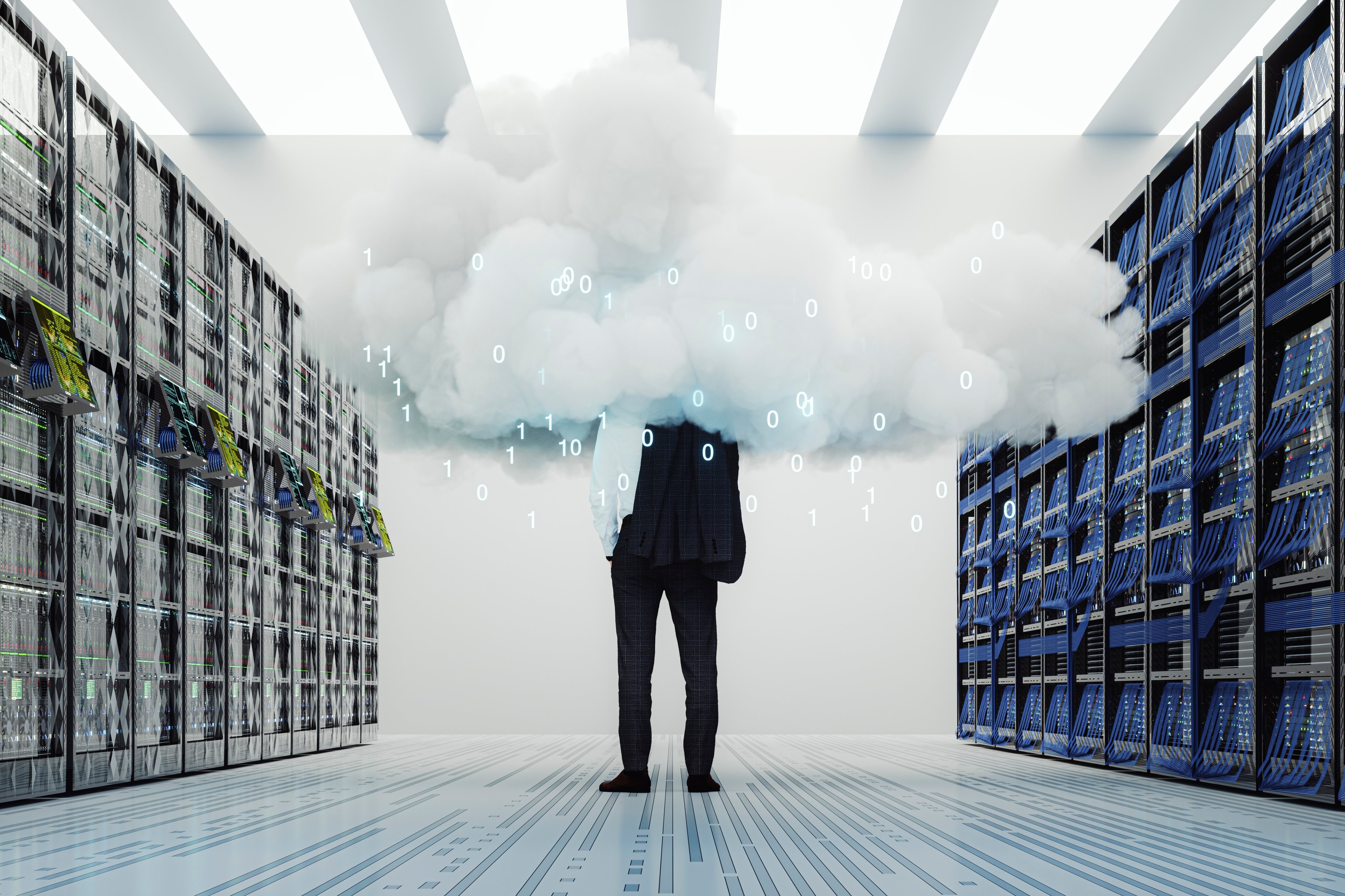 A man in a data center with a cloud covering most of him. 