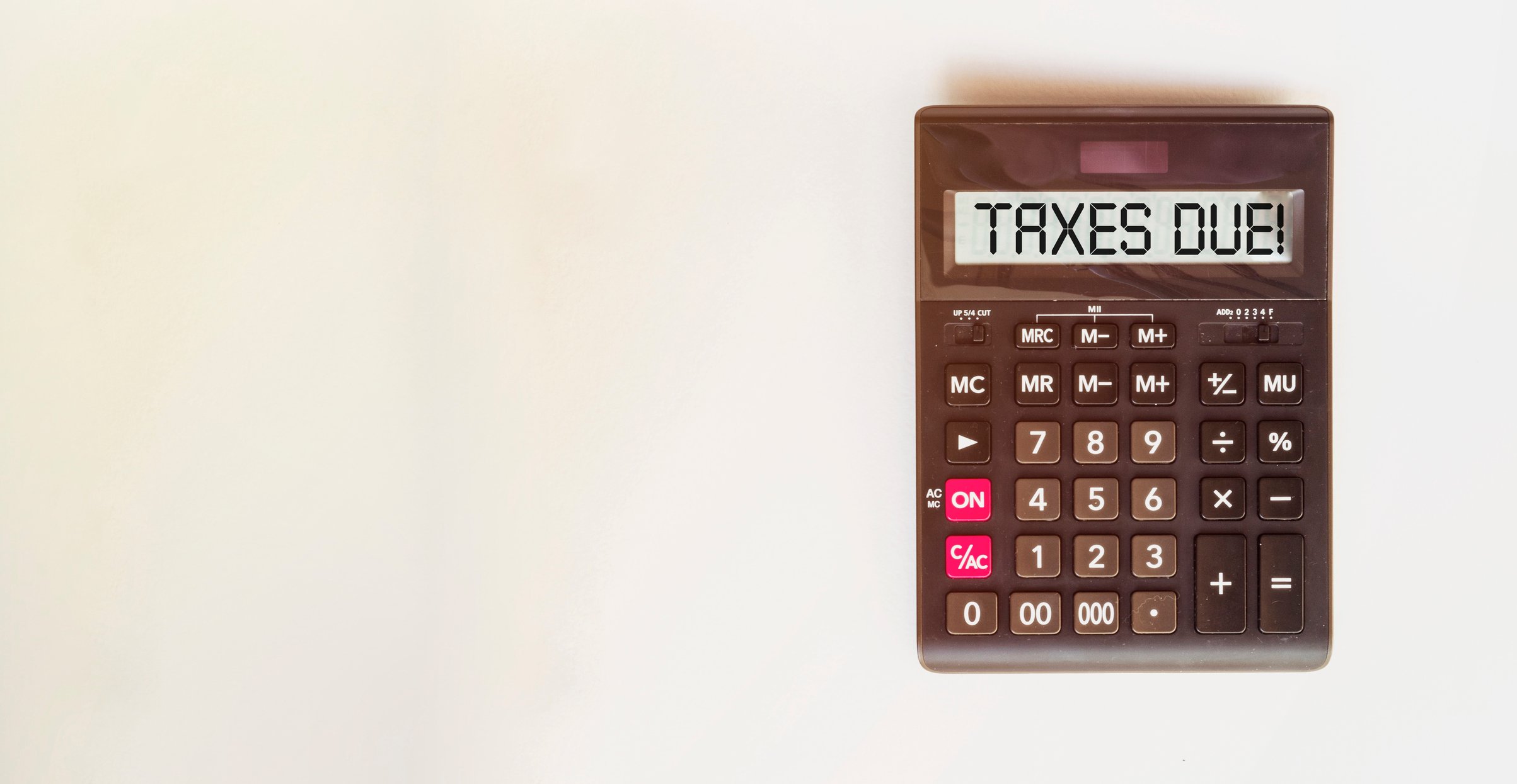 Calculator screen reads Taxes Due