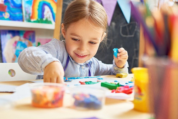girl playing with play-doh