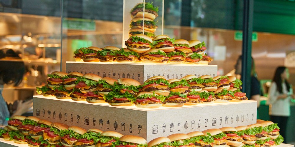 A tower made of Shake Shack hamburgers.