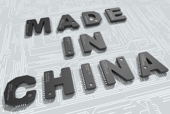 Made in China sign against a circuit board. 