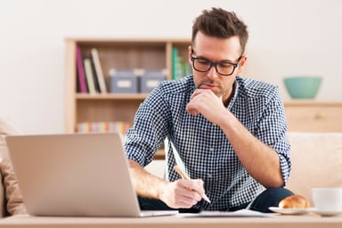man working on budget_GettyImages-463874293