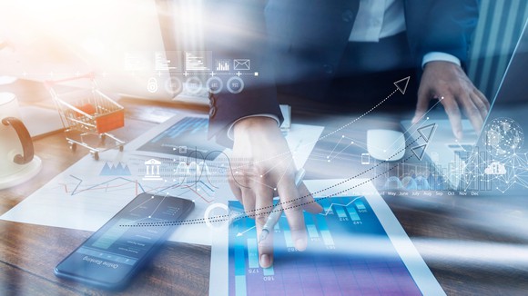 A person touching a tablet.