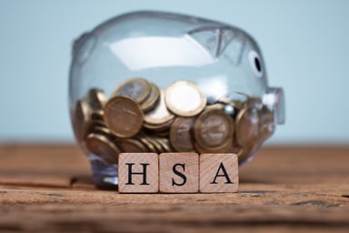 HSA next to piggy bank