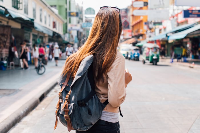 A woman on the street in Southeast Asia. 