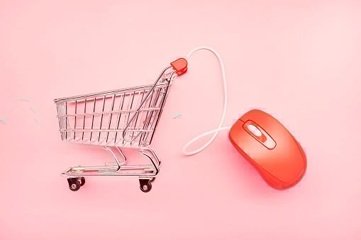 A shopping cart and a computer mouse