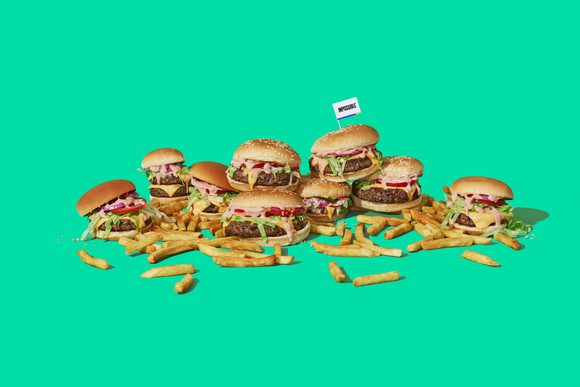 An array of Impossible burgers and fries