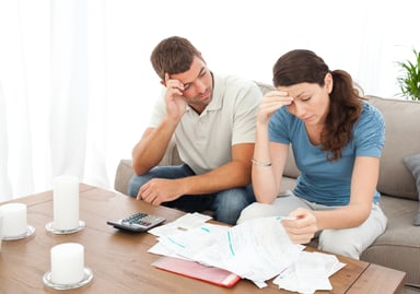 couple stressed over bills_GettyImages-153558462
