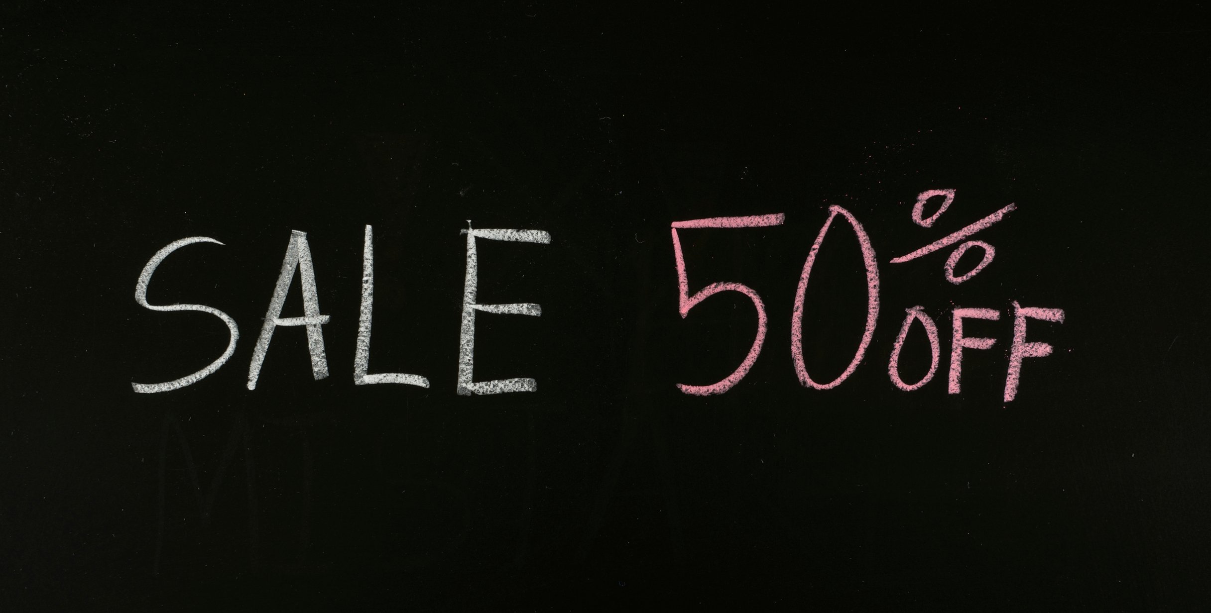 A 50% off sale sign.