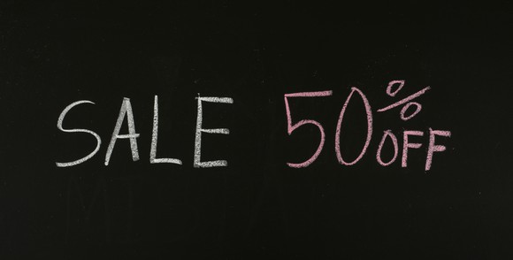 A 50% off sale sign.