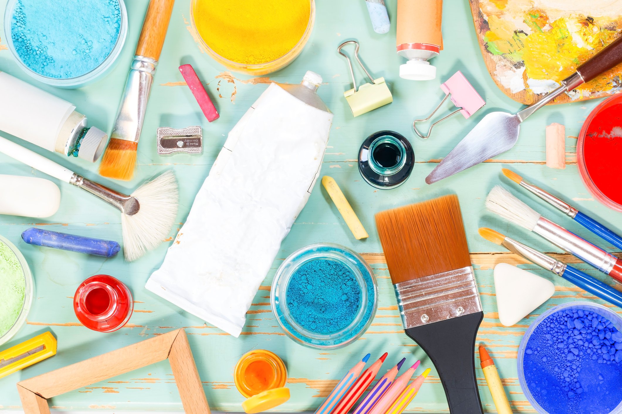 arts and crafts supplies like pain, brushes and sparkles