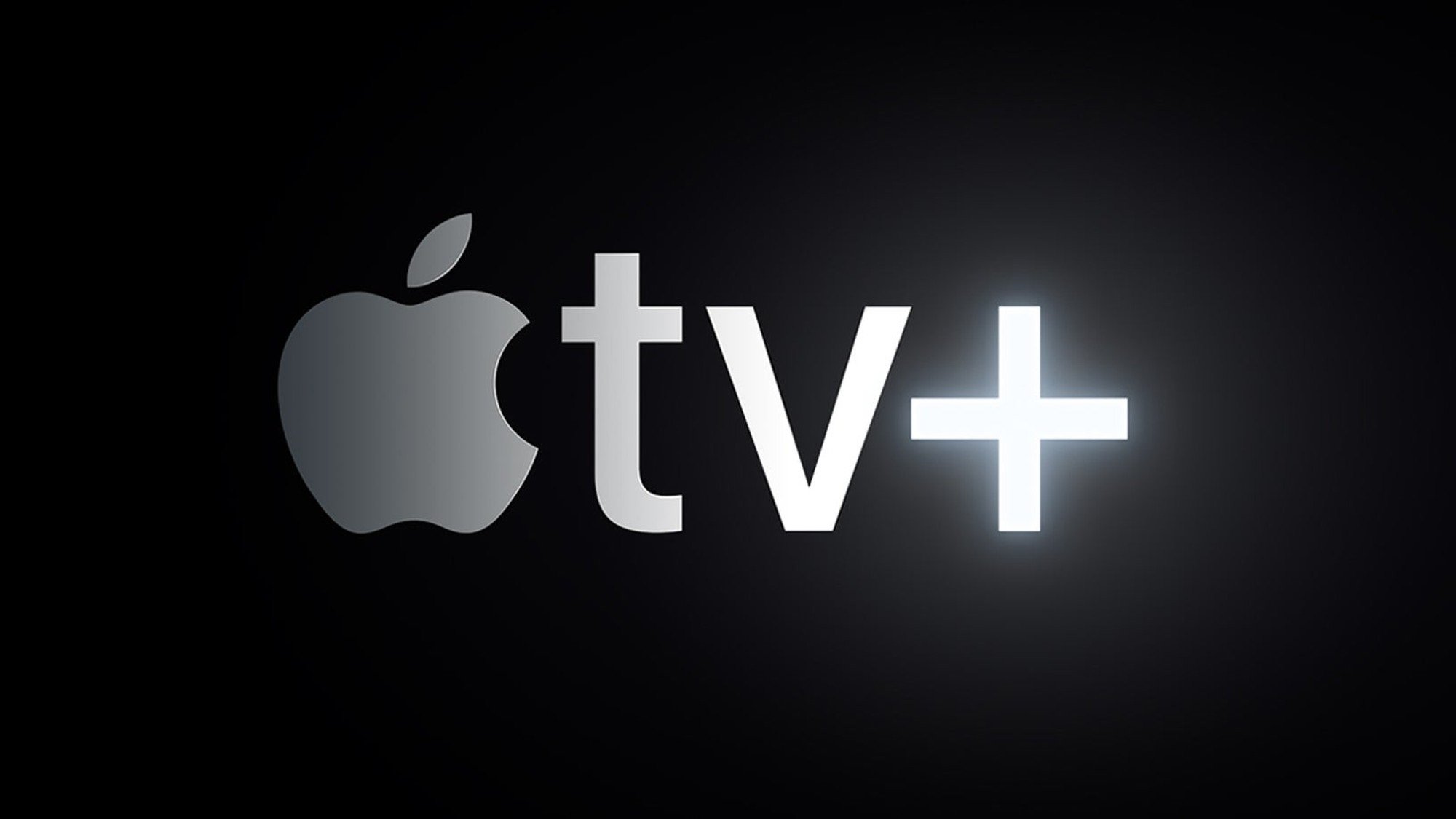 Apple TV+ logo in gray against a black background. 