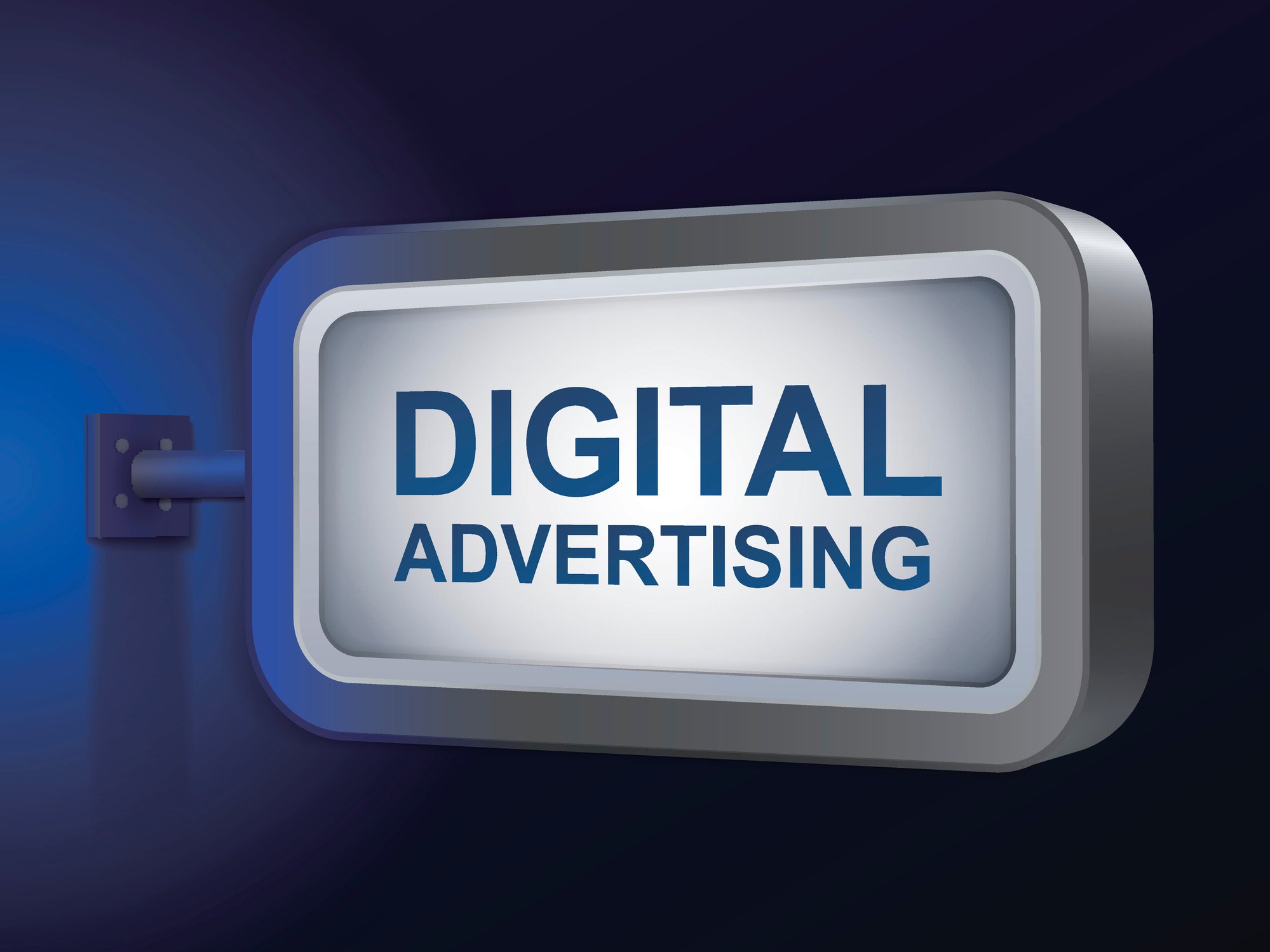 A silver sign displaying the words "digital advertising" protrudes from a wall.