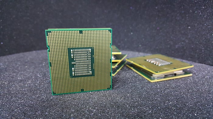 Semiconductors on a table with a black background. 