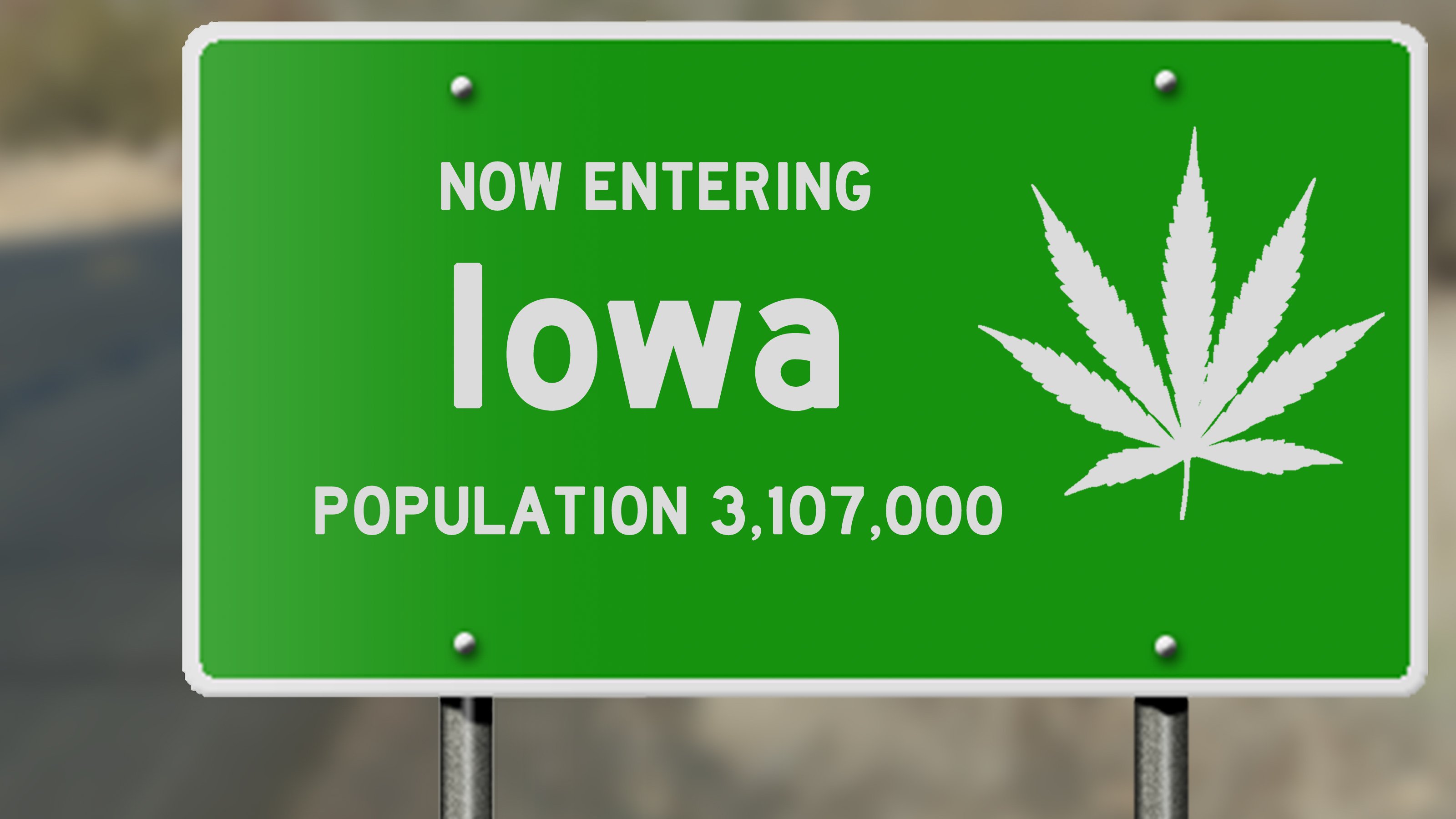 Iowa road sign with marijuana leaf.