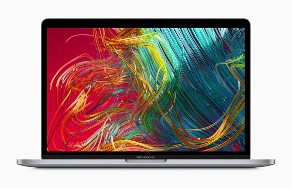 Apple Mac notebook open with swirls of color on the screen. 