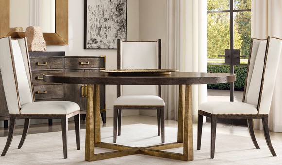 A furnished room highlighting a table and chair set.