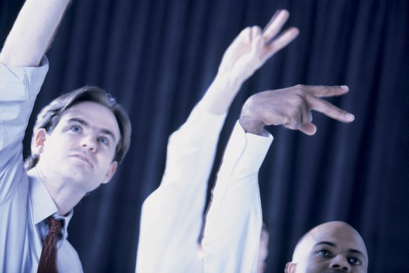 Two financial traders at work.