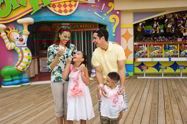 Family enjoying a theme park.