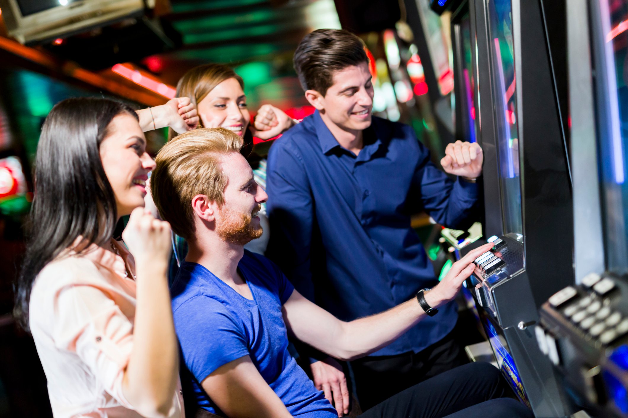 friends playing arcade games