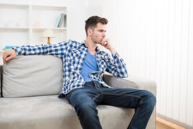 Man sitting on couch