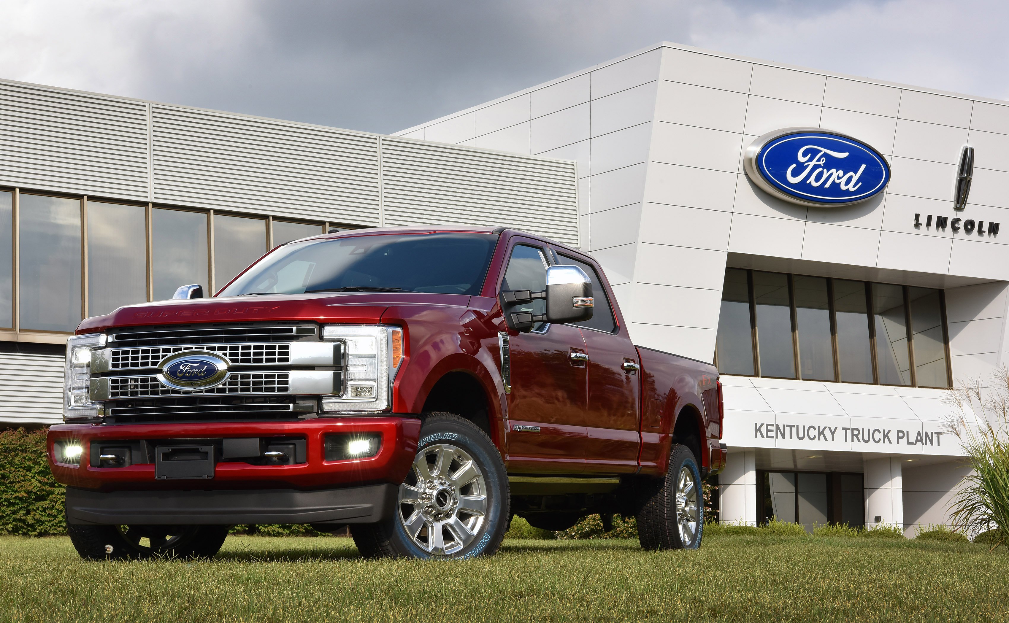 A red Ford Super Duty pickup in front of Ford's Kentucky Truck Plant in Louisville.