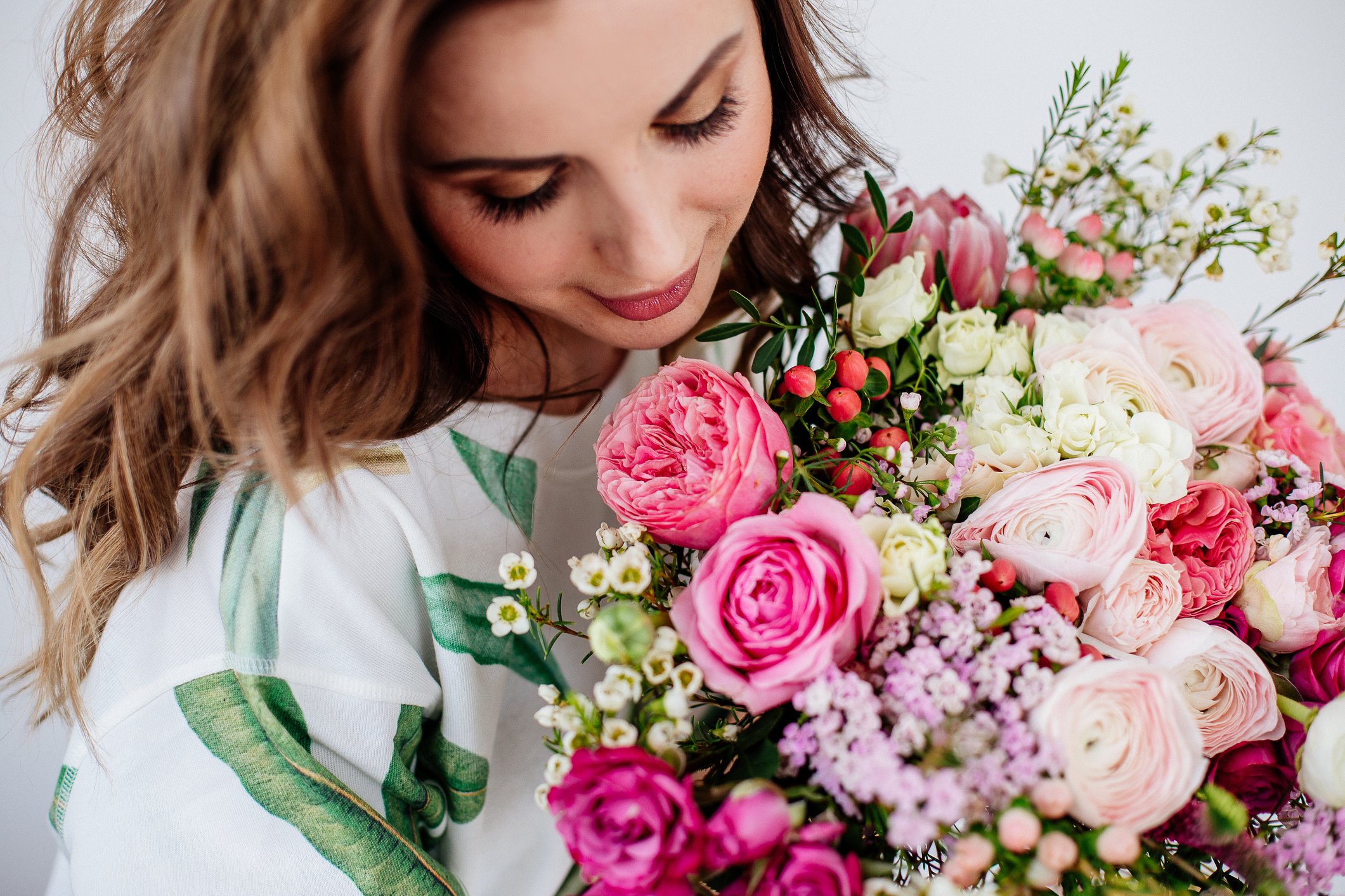 Woman with bouquet of roses