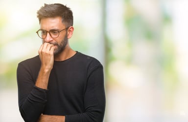Man biting nails_GettyImages-1042788954