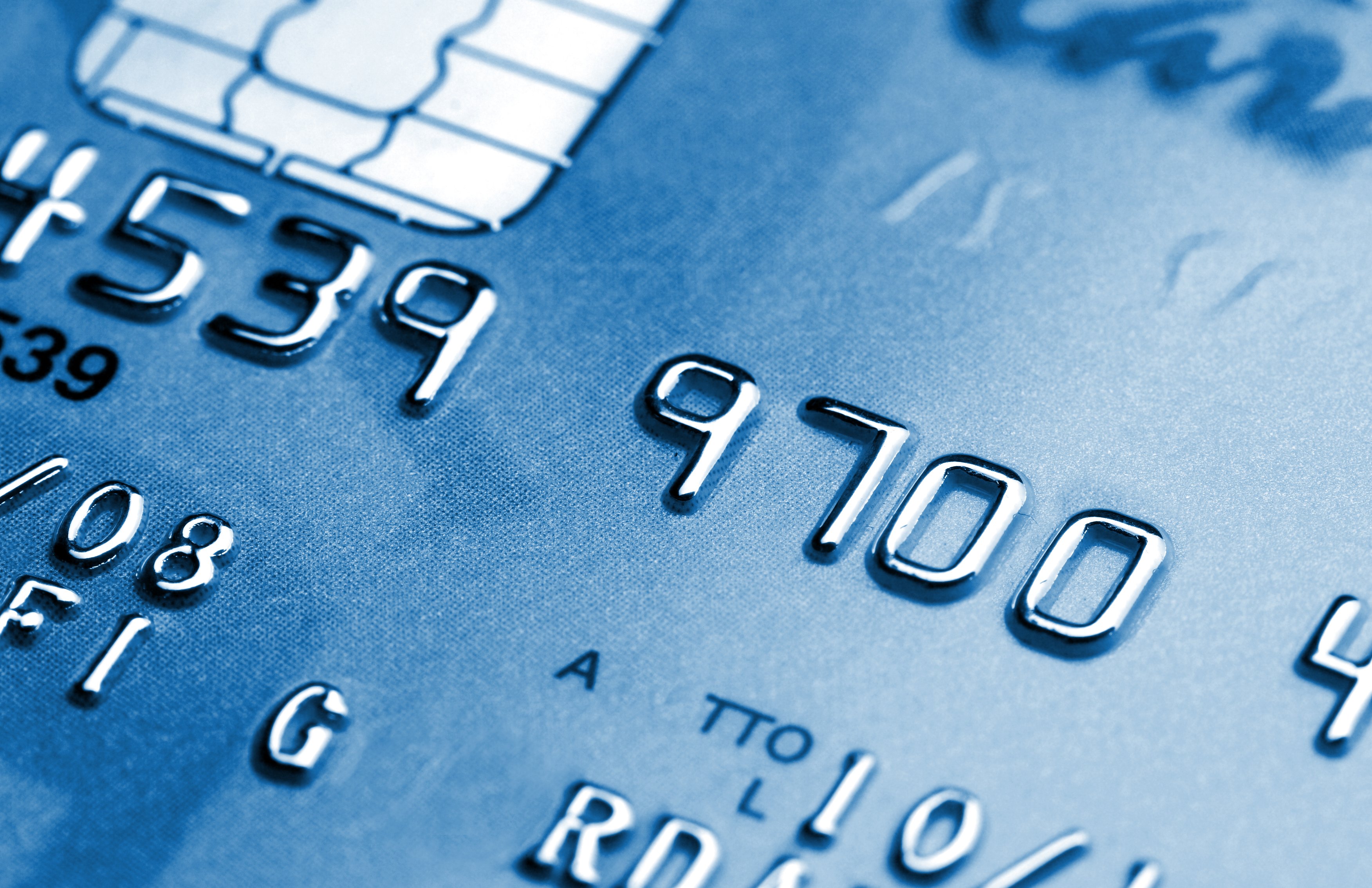 A tight close up of a blue credit card