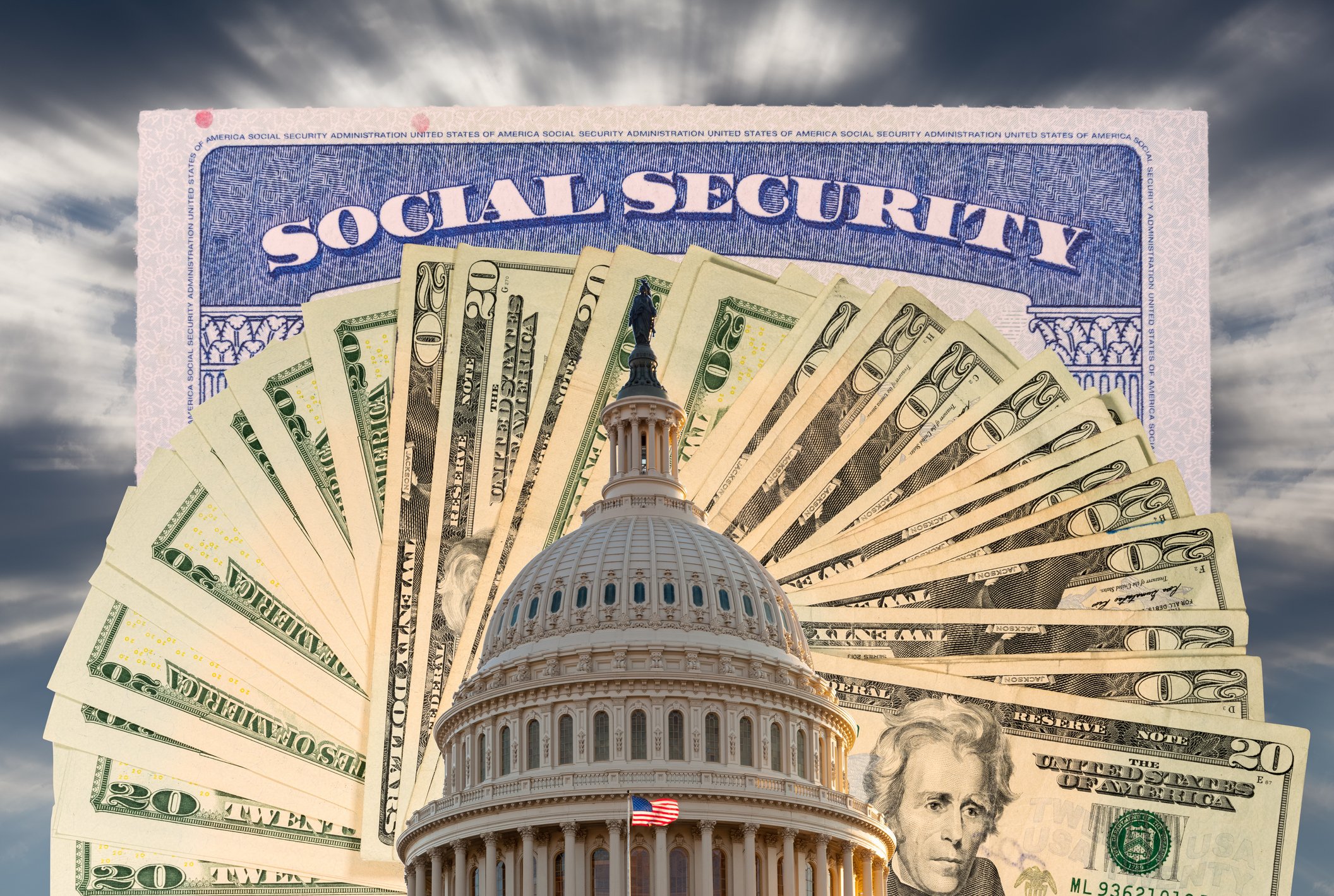Social Security card above $20 bills fanned out with the U.S. Capitol building in the foreground